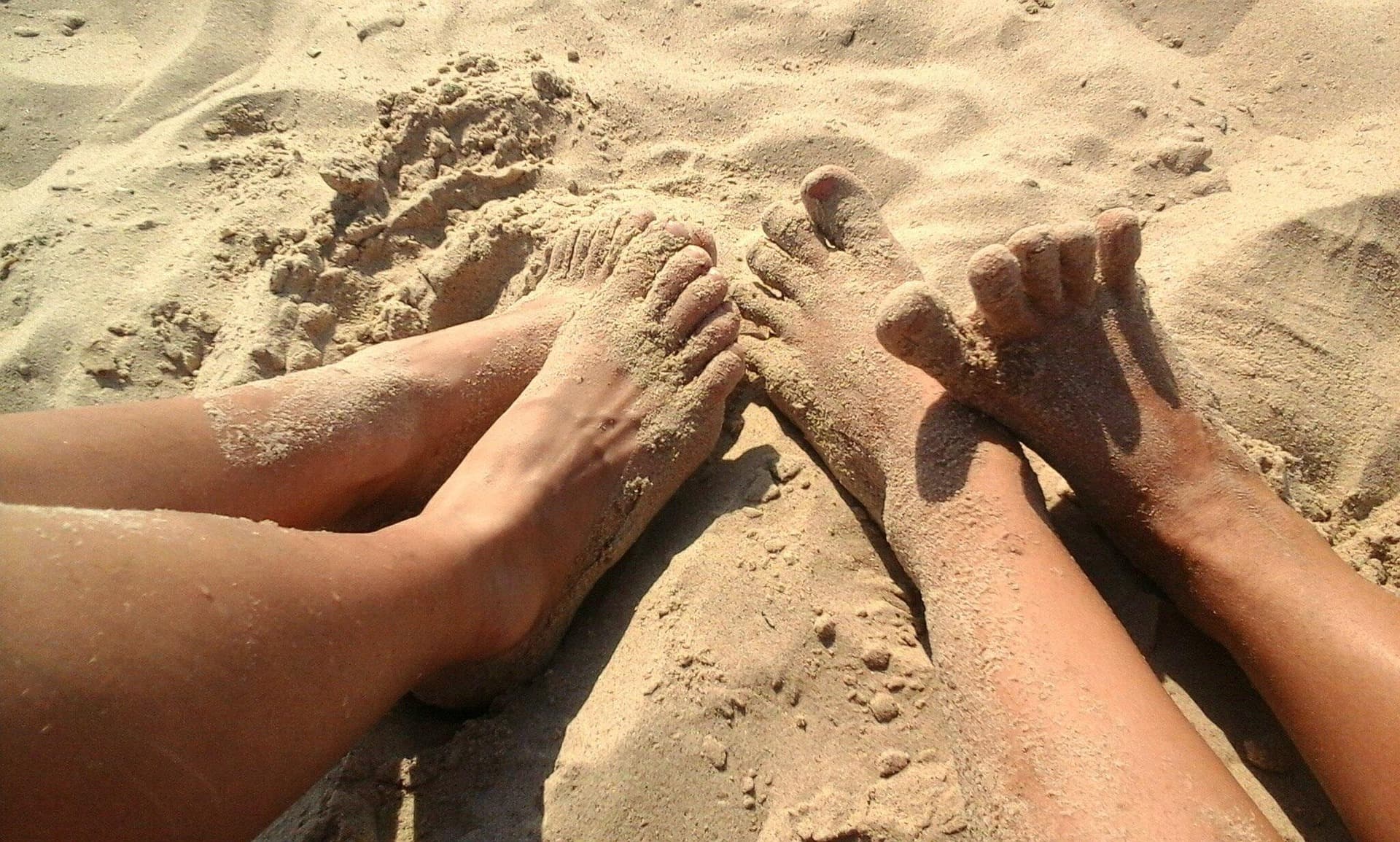 feet in the sand